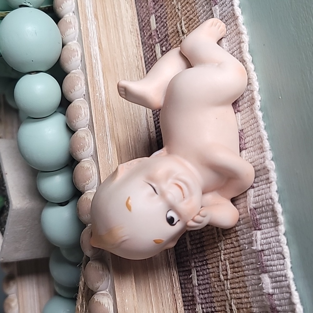 Kewpie Porcelain doll